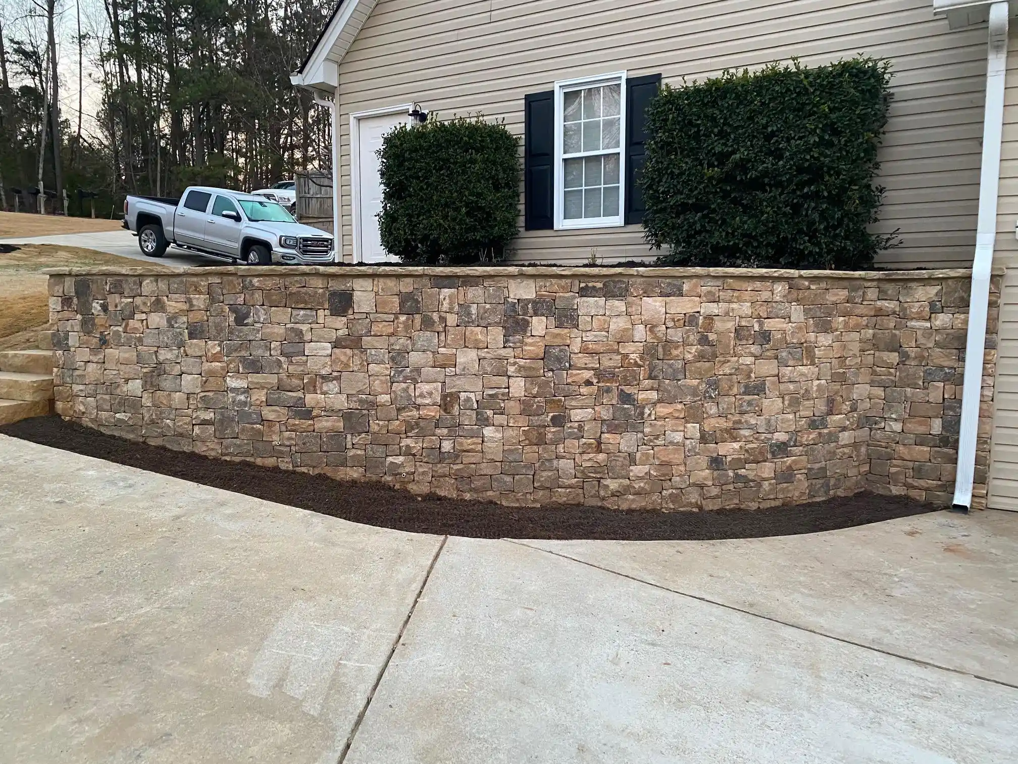 Natural stone retaining wall